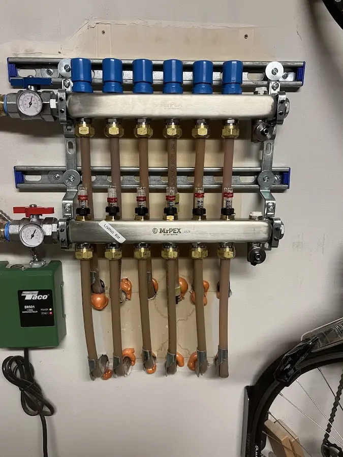 Plumber performing Gas Line Installation at a residential property in Attica